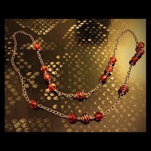 Chunky orange beaded necklace with gold detail